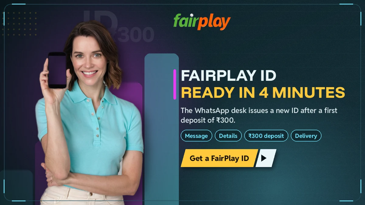 Desk host holding up a phone that shows a freshly issued FairPlay ID and password